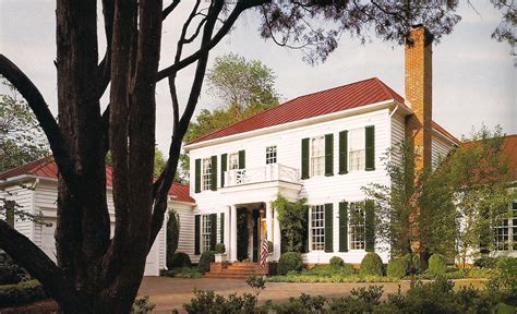 white house with red roof